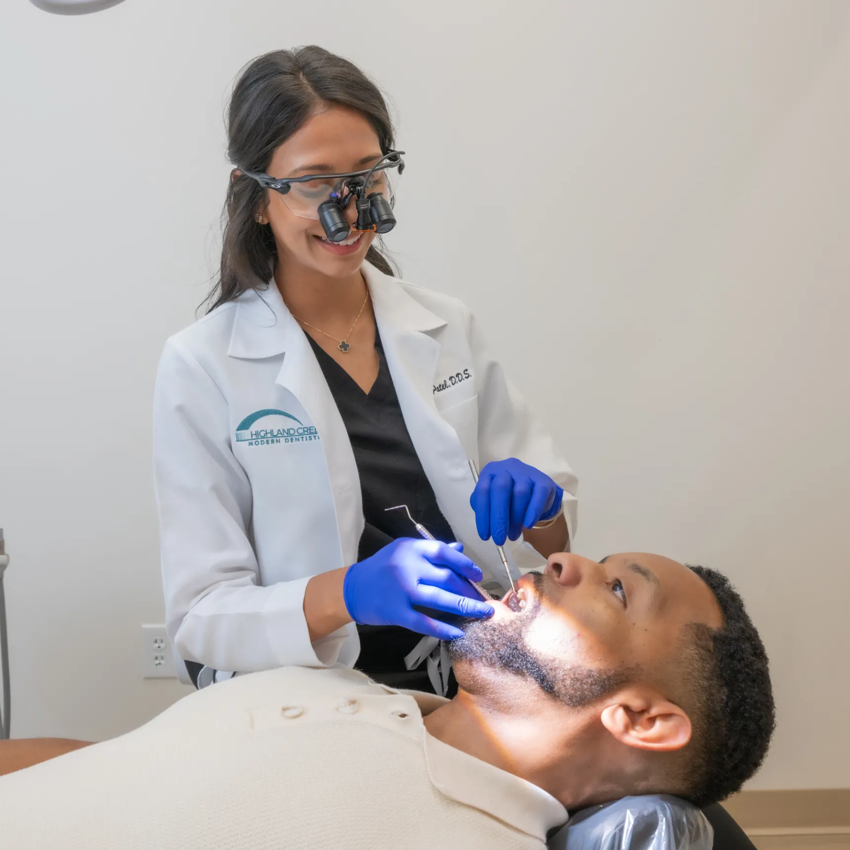 Dr. Bijal Patel checking patient up